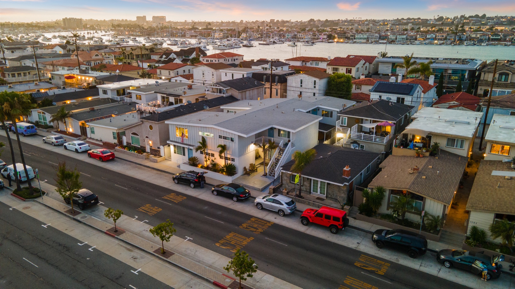 Lightsand apartments on the Balboa Peninsula at twilight